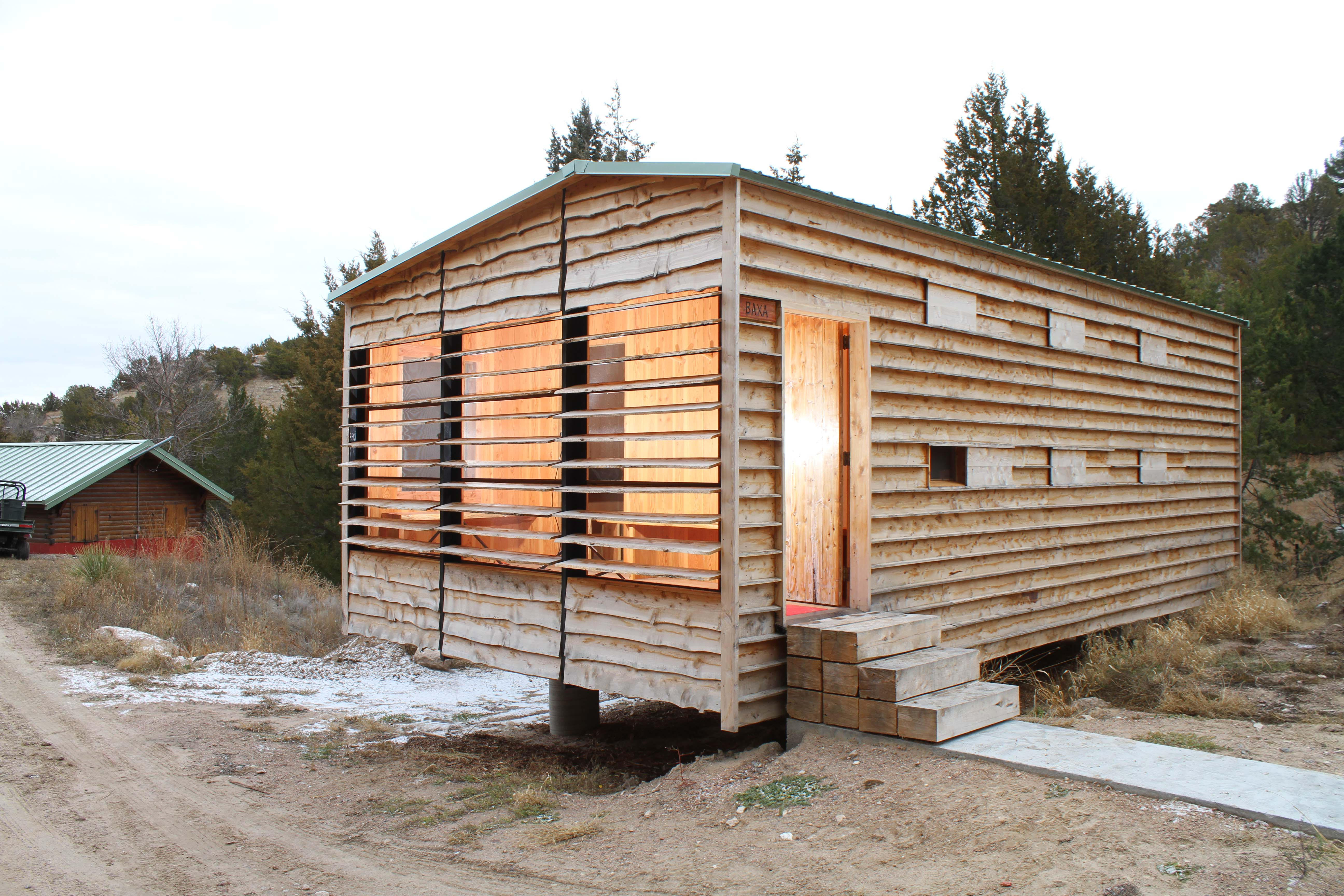 The small, unique cabin was built with cross-laminated timber (CLT), but adorned with furniture constructed from locally-harvest redcedar wood. (Photo courtesy of Jason Griffiths) 