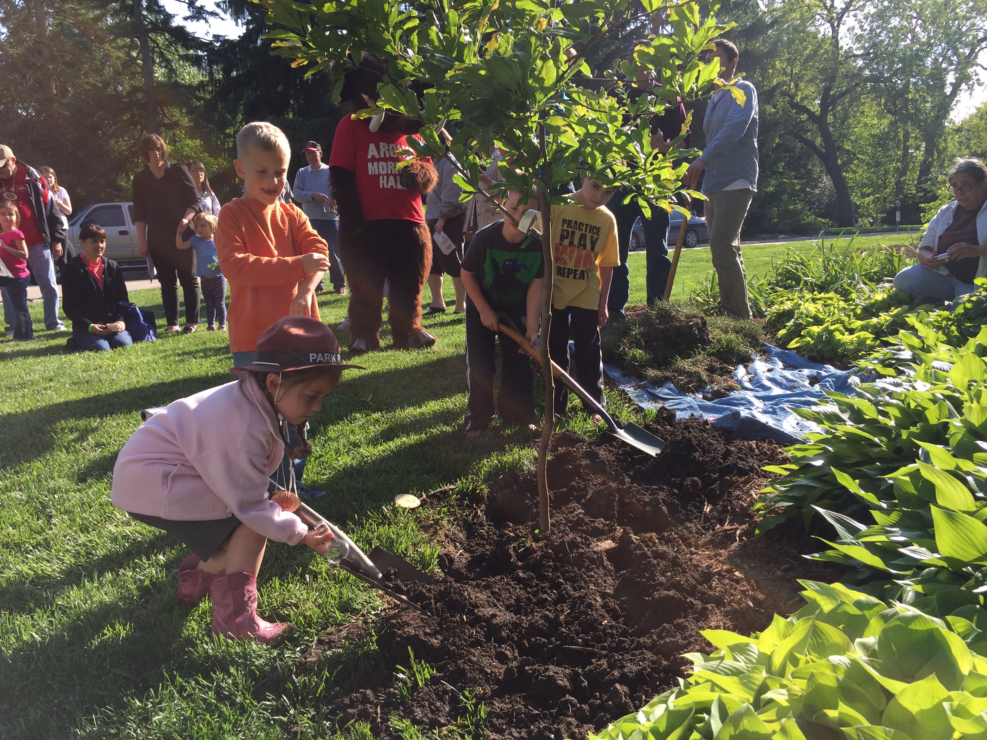 Photo of children planting a tree